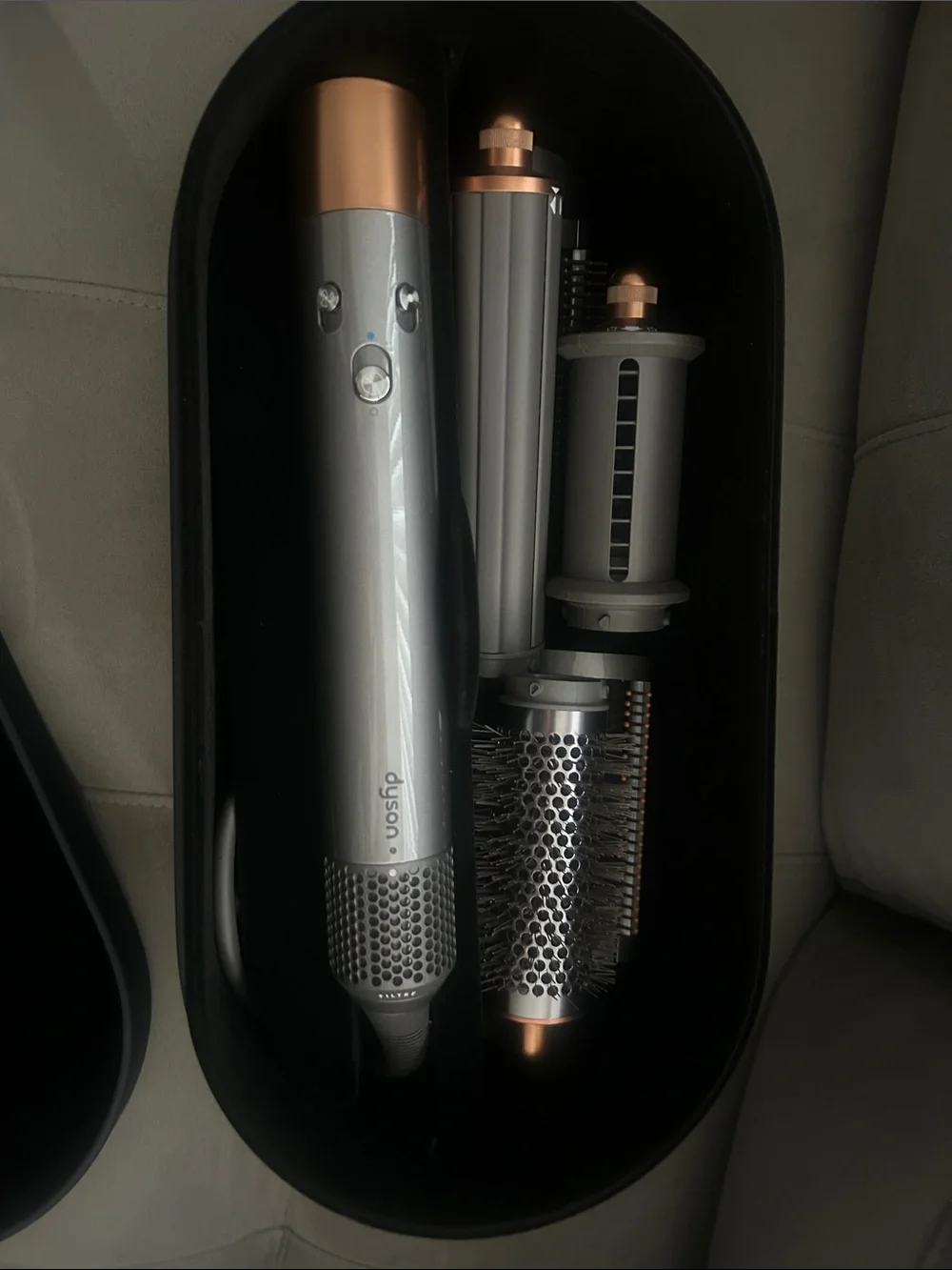 Dyson Men’s/Women’s Hair Styler in Gray with Copper Accents.